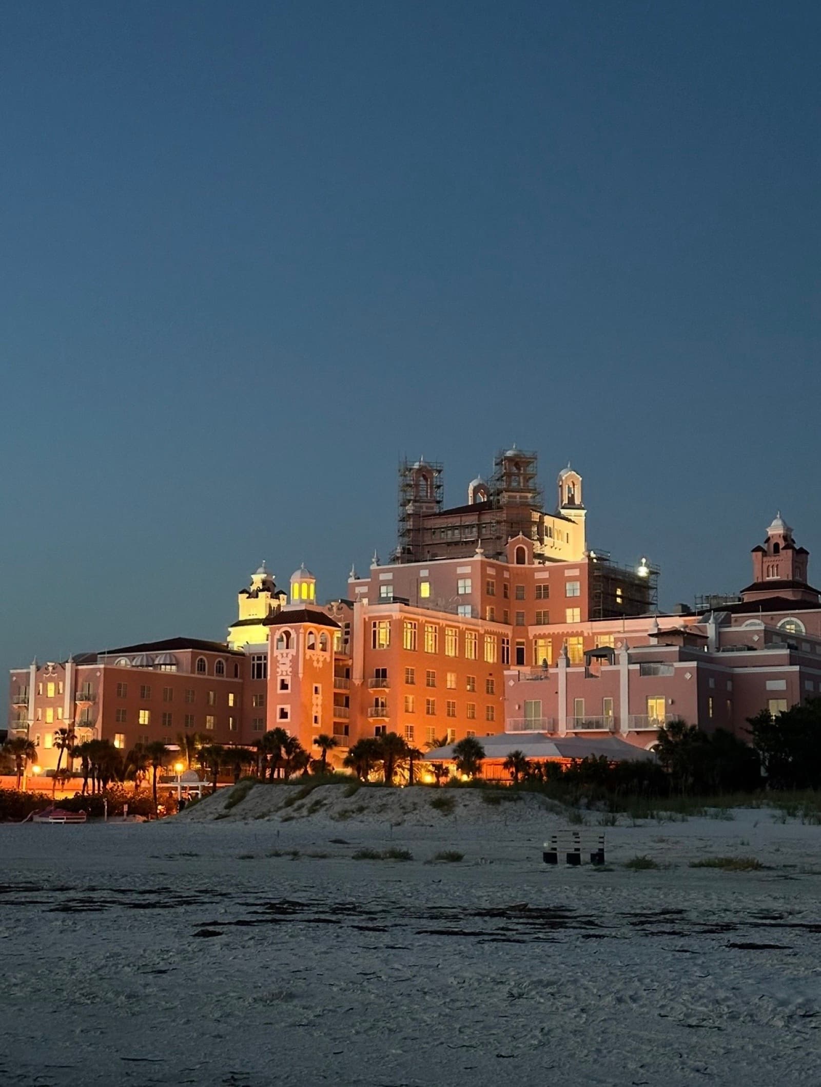 The Don CeSar Hotel at dusk on St. Pete Beach — the iconic pink Mediterranean Revival landmark of Pinellas County, Florida, photographed from the sand by Luke Salm.